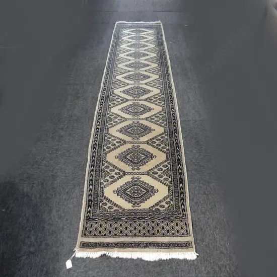 HAND KNOTTED WOOL PILE RUNNER 2900x600mm (Some insect damage)