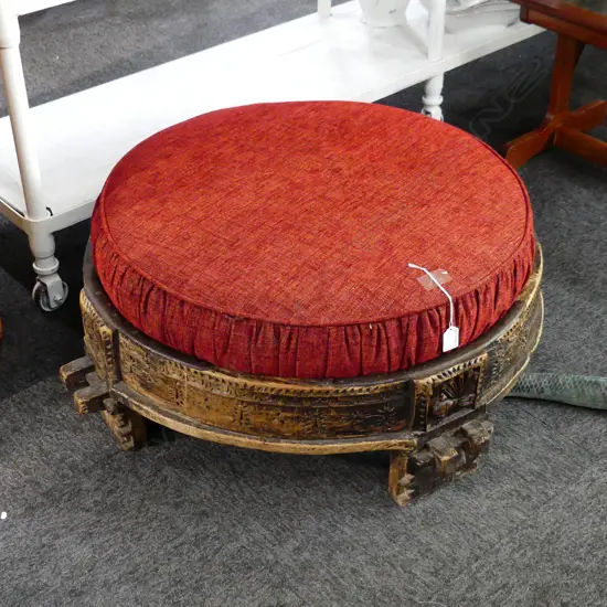 INDIAN OTTOMAN - CARVED WOODEN BASE, RED CUSHION 700mm dia