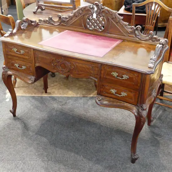 SOLID MAHOGANY CARVED LOUIS FIFTEENTH STYLE HANDMADE 20THC DESK.  UPSWEPT BACK OVER 4 & ONE FRIEZE DRAWER. 1200X1050mm