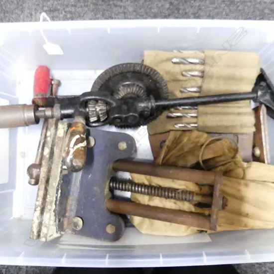 BOX OF HEAVY TOOLS – CLAMP, HAND DRILL, TWO ROLLS OF DRILL BITS, PLANE BLADES
