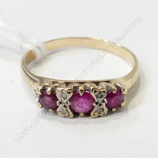 9CT RUBY DIAMOND RING 2.4 GRAMS SIZE R