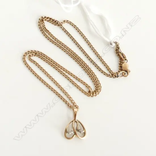 14ct GOLD 2 DIAMOND PENDANT ON 9CT CHAIN 4.4gms 45CM