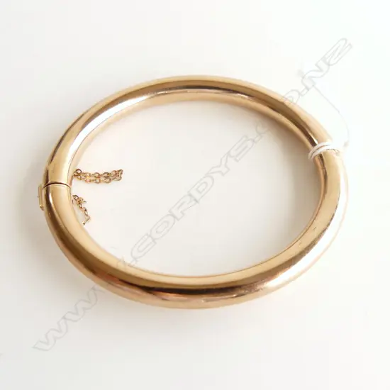 9CT GOLD HINGED BANGLE  Hollow 15gm (small hole)