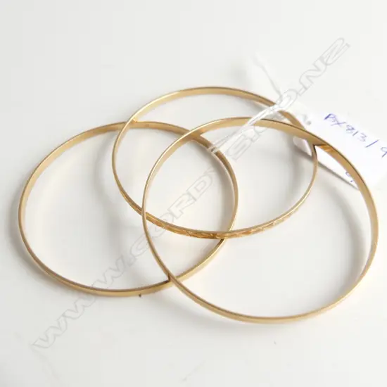 3 9CT BANGLES 23.8 GRAMS 60mm int. dia.
