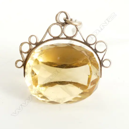 c1900 9CT SCROLLFRAMED CITRINE FOB SPINNER