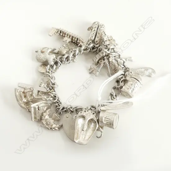 SILVER CHARM BRACELET packed with waka + slippers + grand piano etc  etc 71.8gms