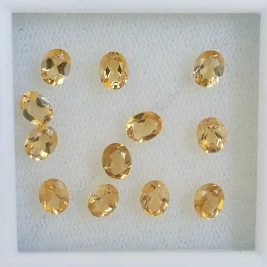 LEMON CITRINE OVAL 12 =3.87 CT