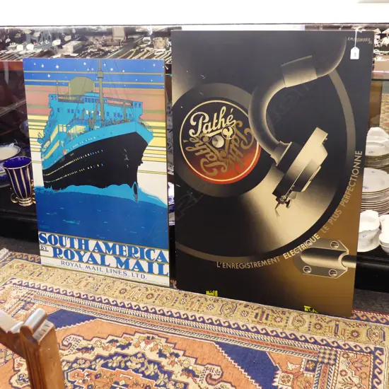 TWO LARGE POSTERS ON BACKING BOARD. 'SOUTH AMERICA ROYAL MAIL' 890X620 & 'PATHE ELETRIQUE' 680X100mm