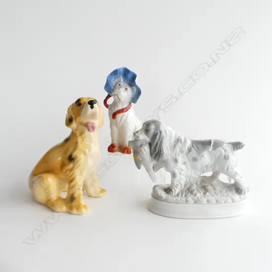 3 CERAMIC VINTAGE DOGS;  HUNTING DOG WITH PHEASANT & 2 OTHER DOG ORNAMENTS