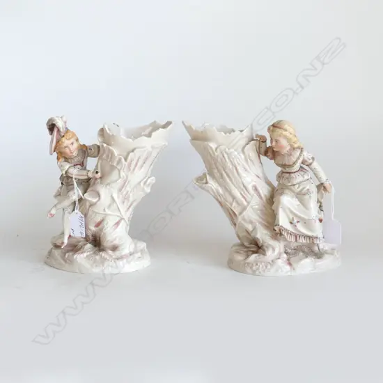 19THC GERMAN PORCELAIN VASES BY RUDOLSTADT. AS MALE AND FEMALE CHILDREN ON TREE .FEMALE WITH HAND DAMAGED BOTH 220mm  