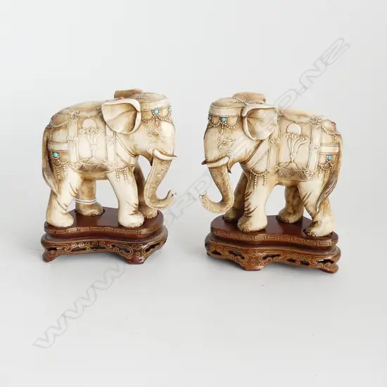 PAIR OF OLD INDIAN IVORY ELEPHANTS ON WOOD BRASS INLAID STANDS SET WITH TURQUOISE AND CORAL H.95mm (ONE MINOR DAMAGE)
