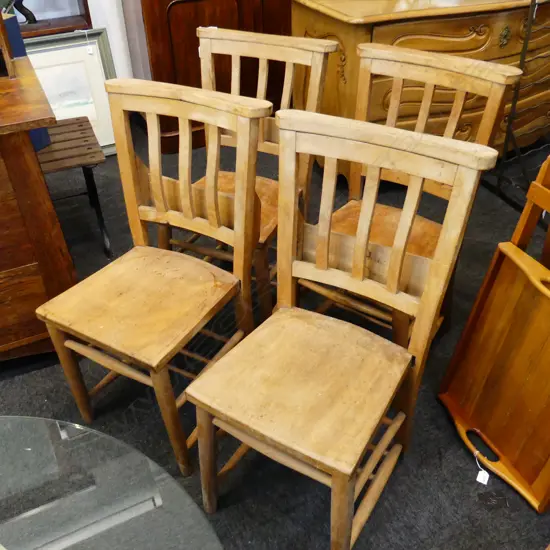 4 WOODEN CHURCH CHAIRS