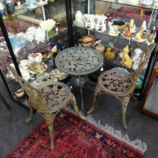 CAST IRON TABLE & CHAIRS