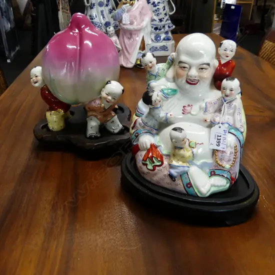 2 CHINESE CERAMICS; CHILDREN ON BUDDHA, HOLDING RADISH H.250mm