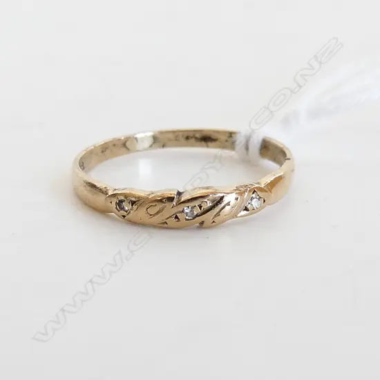 9CT GOLD DIAMOND SET ETERNITY RING, 1.2gms