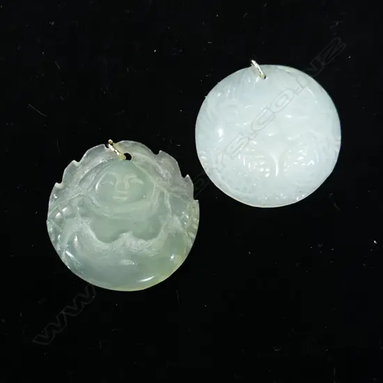 2 CARVED JADE PENDANTS 