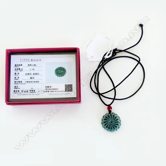 CERTIFIED NATURAL JADE PENDANT ON BLACK WAX CORD, IN BOX WITH CERTIFICATE