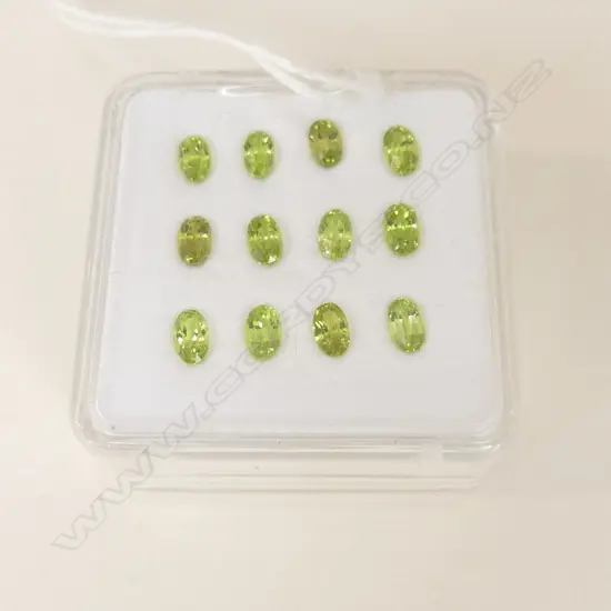 PERIDOT OVALS 5X3 12 = 3.80CT