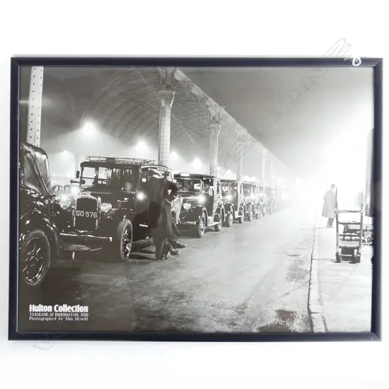 FRAMED B&W HUXTON COLLECTION PRINT 'TAXI RANK AT PADDINTON 1950" PHOTOGRAPHER, SLIM HEWITT 690 X 600mm