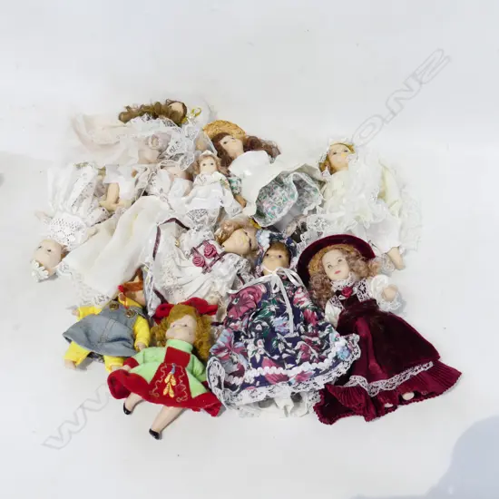 11 MINATURE DOLLS OF VARIOUS TYPES.