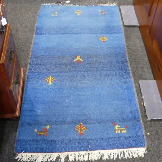 SMALL BLUE GABBEH RUG END NEEDS REBINDING - WORN 1470x740mm