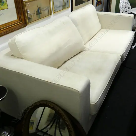 CREAM THREE SEATER SOFA