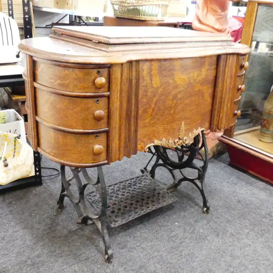 OLD UNITY BRAND PEDESTAL SEWING MACHINE WITH CONTENTS IN DRAWERS. 