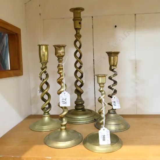 FIVE ' BARLEY TWIST ' BRASS CANDLESTICKS. TALLEST 365 SMALLEST 160mm