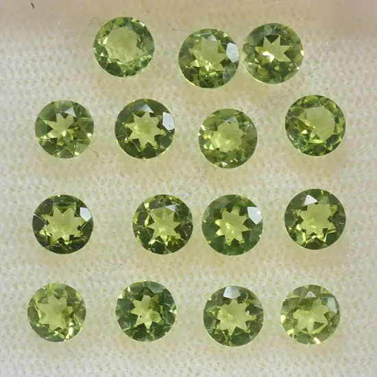 PERIDOT 5MM ROUND  15 = 6.58CT