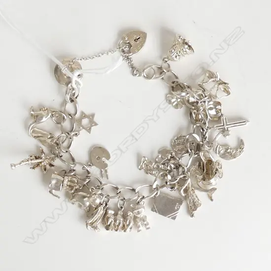 ST SILVER CHARM BRACELET, 27 CHARMS