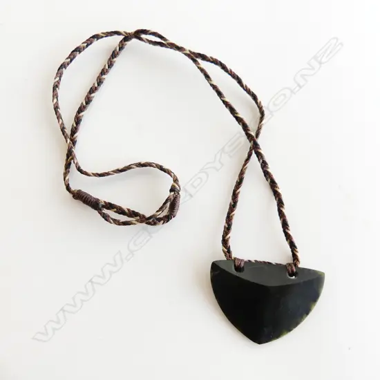 Carved pounamu (gem Obsidian) Niho mango (shark tooth) pendant. L 55m
