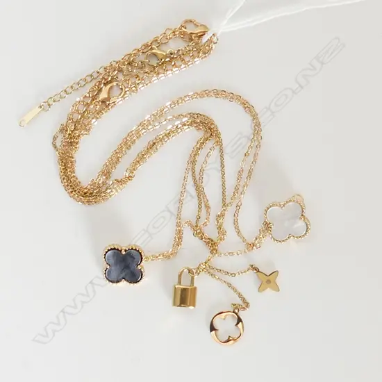 3 GOLD TONE FASHION NECKLACES, 2 W CLOVERS, 1 W CHARMS