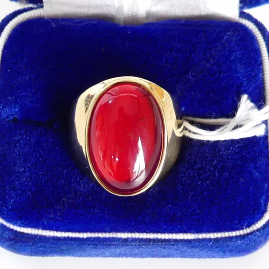 GOLD TONE OVAL RING W RED STONE IN BOX