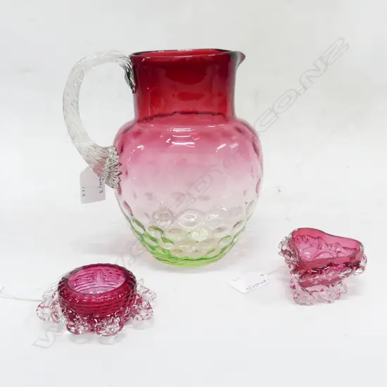 VICT CRANBERRY GLASS JUG H200MM & 2 CRANBERRY GLASS CONDERMENTS DIA 80MM