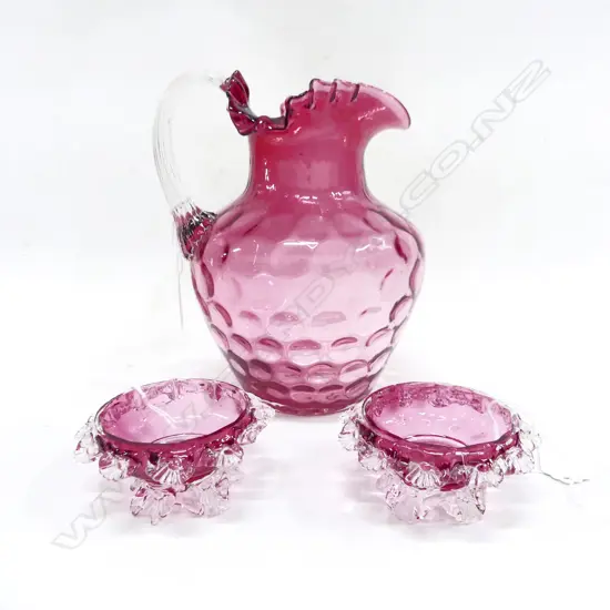 VICT CRANBERRY GLASS JUG H200MM & 2 CRANBERRY GLASS CONDERMENTS minor faults
