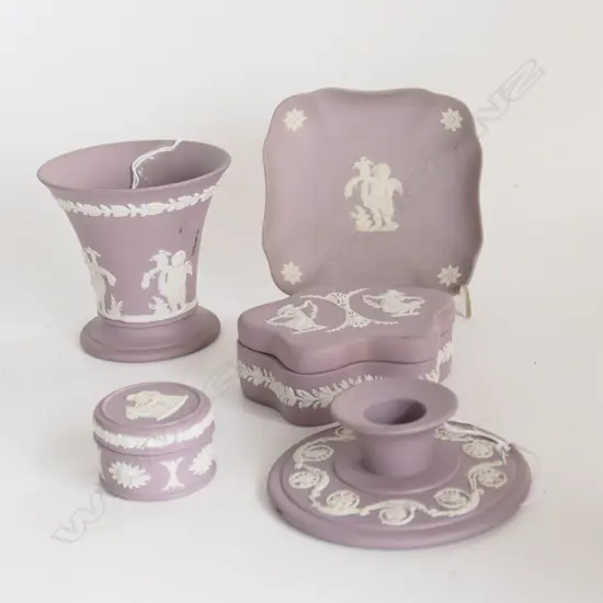 FIVE ITEMS MAUVE WEDGWOOD RELIEF WARE C/STICK FLARED VASE ETC . 
