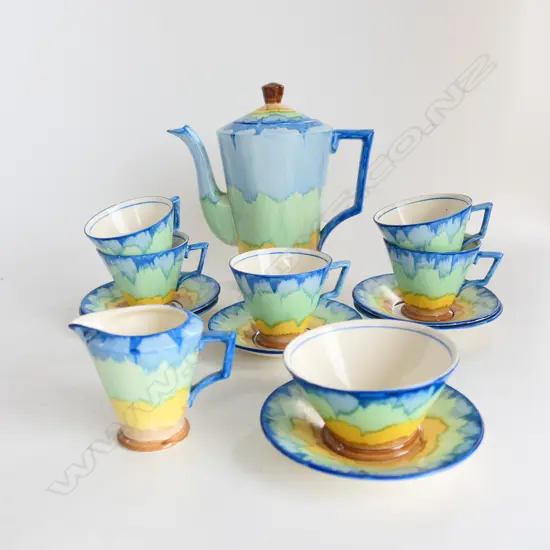 DECO HAND PTD CHINA COFFEE SET IN PALE COLOURS, 6 STGS - LESS 1 CUP, TINY CHIP TO COFFEE POT LID