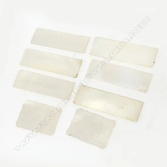 EIGHT QUALITY ANTIQUE MOTHER OF PEARL GAMING TOKENS, WITH CHINESE ENGRAVED DECORATION, L.54MM