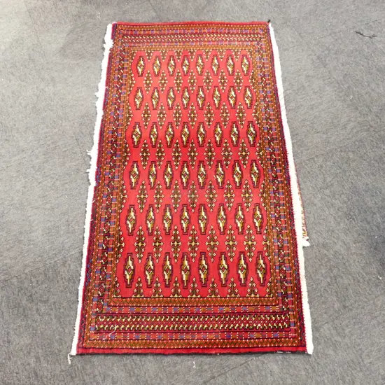 42G - PERSIAN HAND KNOTTED RUG 1330 x 650mm