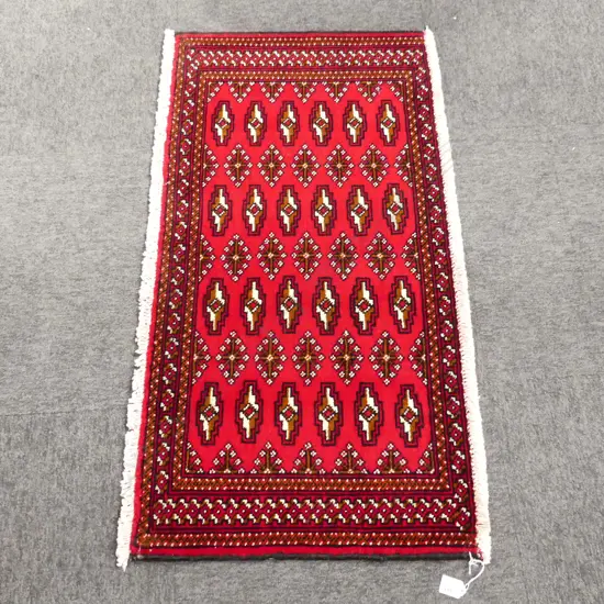 52A - SML PERSIAN HAND KNOTTED RUG 1010 x 500mm