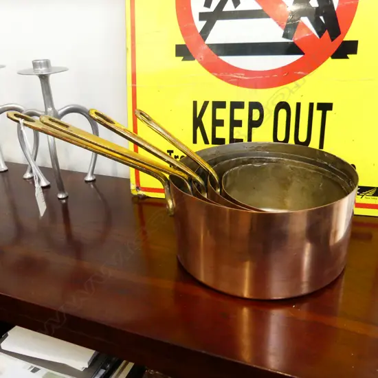 4 VINTAGE FRENCH GRADUATING COPPER SAUCE PANS LARGEST 200mm dia...
