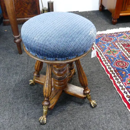 ADJ. ANTIQUE REVOLVING MUSIC STOOL w. CLAW & BALL FEET