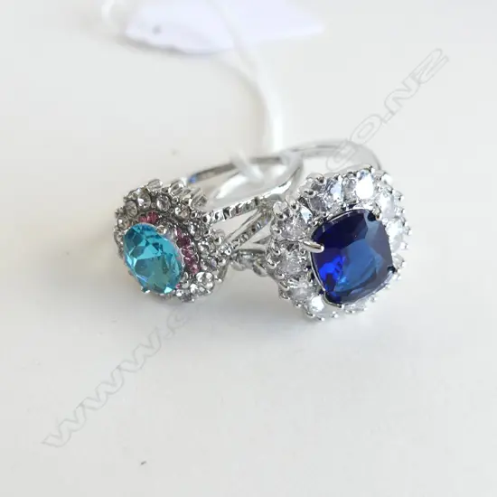 2 SILVER PLATE DRESS RINGS; FAUX SAPPHIRE & DIAMANTES & FAUX TURQUOISE & DIAMANTES