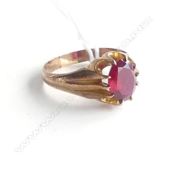 GOLD PLATED METAL RING w. RED PASTE STONE