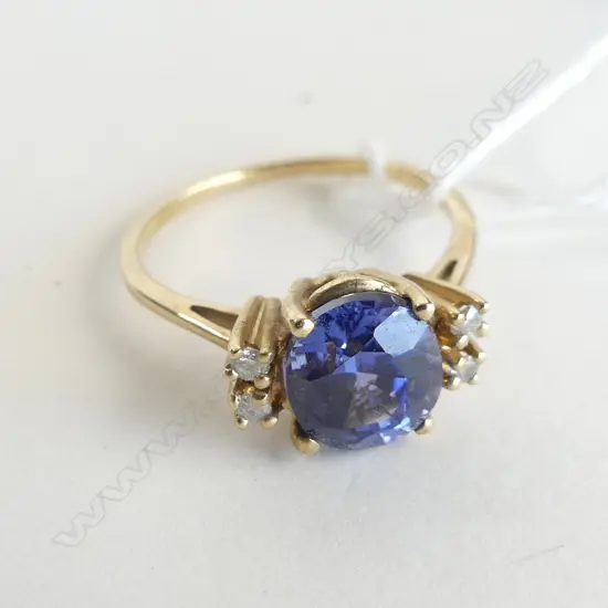 10KP GOLD RING WITH TANZANITE (?) 2.38GMS 
