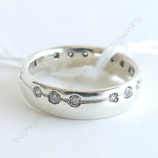 9CT WHITE GOLD & DIAMOND SET BAND 1.5 GMS