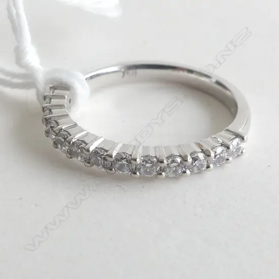 18CT WHITE GOLD BAND WITH CZ'S 2.8GMS 