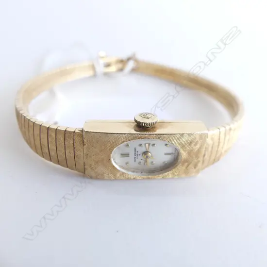14CT GOLD WATCH 21.4 GRAMS W/OUT MOVEMENT