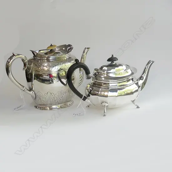 TWO SILVER PLATE TEA POTS