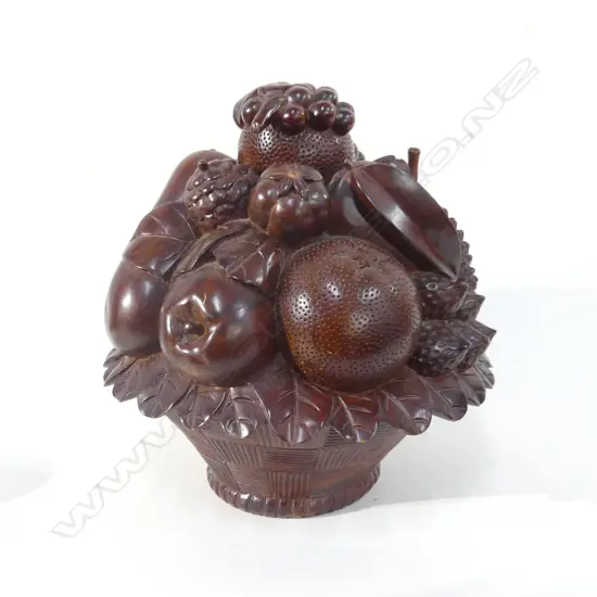LARGE CARVED HARDWOOD ITEM AS FRUIT IN BOWL. POSSIBLY INDONESIAN. H.300mm.